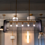 Люстра подвесная овальной формы с металлическим решетчатым абажуром матово-черного цвета и 5 лампами Kichler варинант исполнения - 7 | Loft Concept в Краснодаре