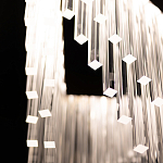 Люстра золотого цвета в форме галочки с каскадом длинных прозрачных трубок Eurofase варинант исполнения - 11 | Loft Concept в Краснодаре